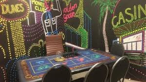 Tampilan tablet menunjukkan kartu Bingo dengan nomor yang cocok dan tombol klaim hadiah